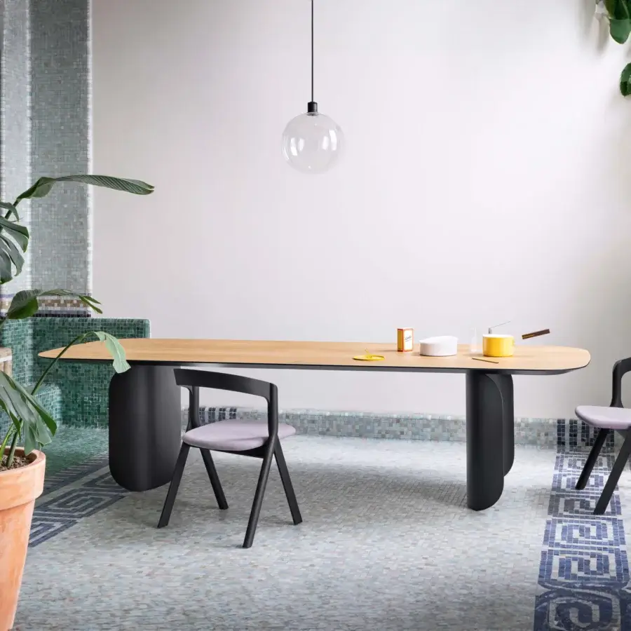 Exceptional Miniforms Barry table with a natural wood tabletop and black curved pedestal legs crafted in a matte finish