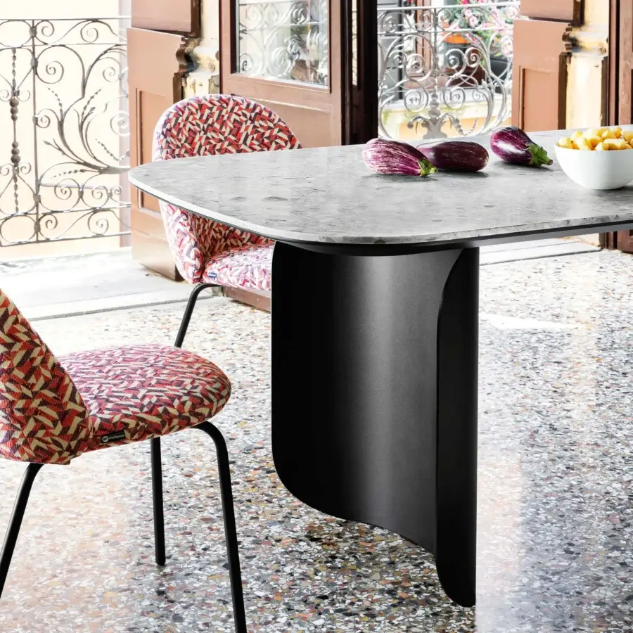 Exceptional Miniforms Barry table with a smooth grey tabletop exhibiting mottled patterns and a matte black curling pedestal base