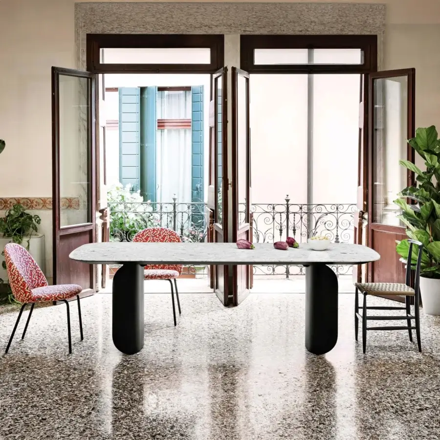 Distinguished Miniforms Barry table with a rounded rectangular composite top in varied gray tones and matte finish