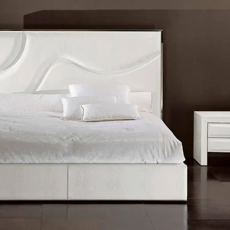 Distinguished Rugiano Riflesso bed with textured synthetic upholstery and sleek bronze metal detailing