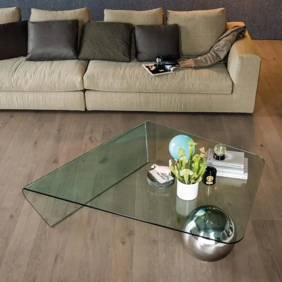 Elegant Cattelan Italia Globe coffee table with curved clear glass and polished reflective stainless steel base