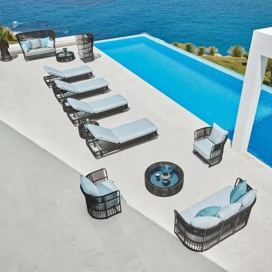 Sophisticated Varaschin Tibidabo high sofa with a hand-woven dark synthetic fiber frame and light blue cushions