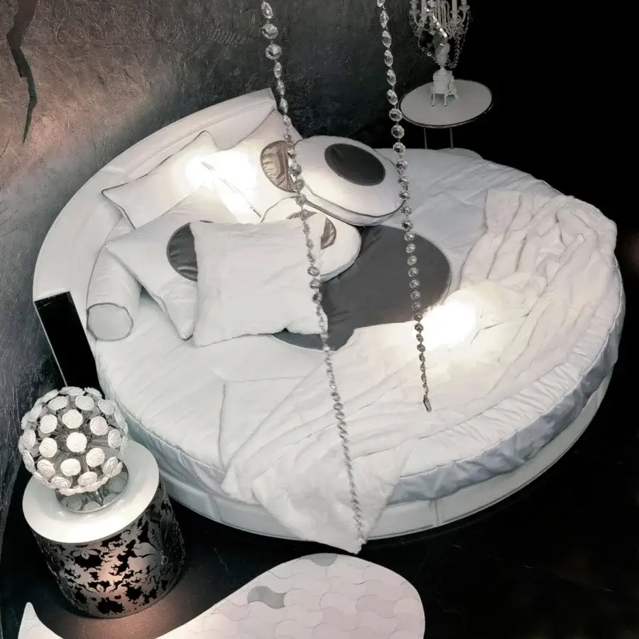 Exclusive Rugiano Venus bed with innovative round design and luxurious leather upholstery in white finish