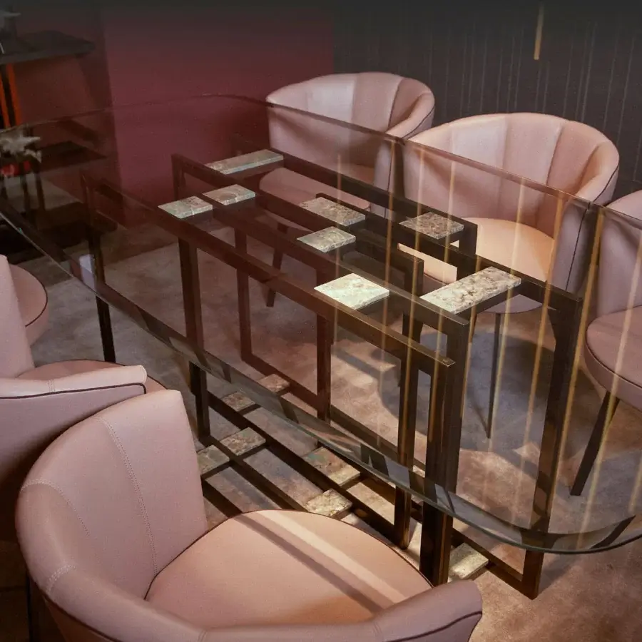 Superior Borzalino Diva chair in light pink fabric with spaced bulges and dark lacquered metal base
