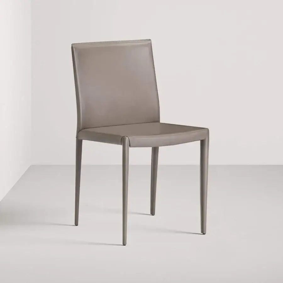 Distinguished Frag Lilly chair with light gray upholstery in Leather or Saddle Leather and ornate rear seams