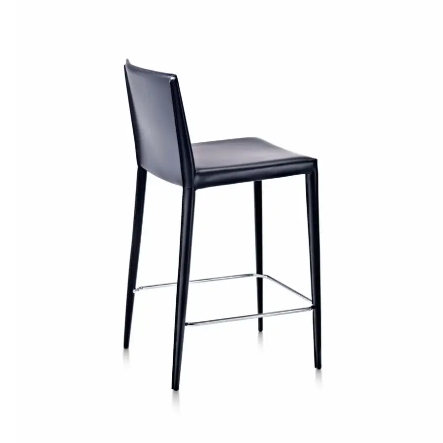 Elegant Frag Lilly stool upholstered in black saddle leather with a polished metal footrest crafted in Italy