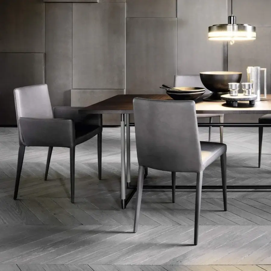 Distinguished Frag Bella chair upholstered in medium gray, likely crafted from matte leather or leatherette with an innovative flexible steel backrest