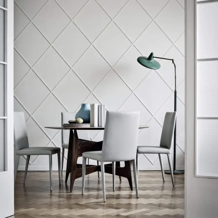Superior Frag Bella chair upholstered in light grey with a smooth material and matching metal legs crafted in Italy