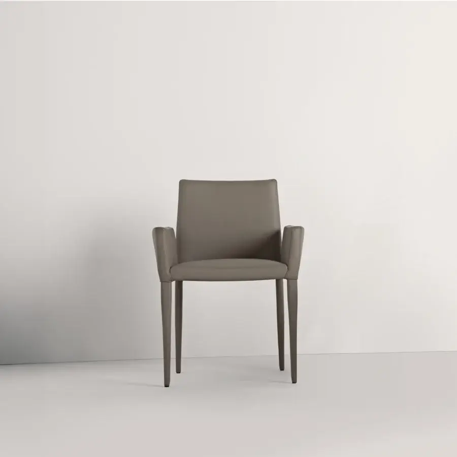 Superior Frag Bella chair with gray leather-like material, flexible steel backrest and tapered legs crafted in Italy