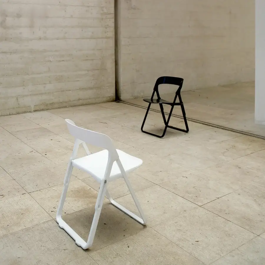 Harmonious Casamania Bek chair crafted in Italy with injection-reinforced fiberglass and a clean white finish