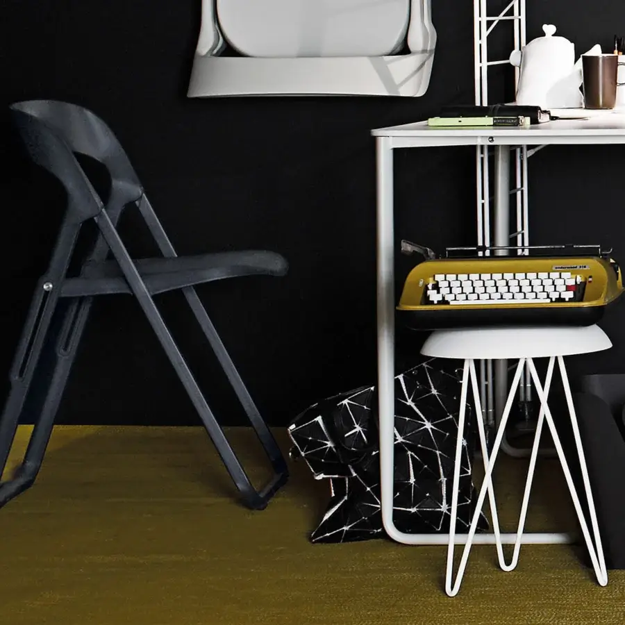 Elegant Casamania Bek chair crafted in Italy with fiberglass-reinforced injection molding and a dark matte finish