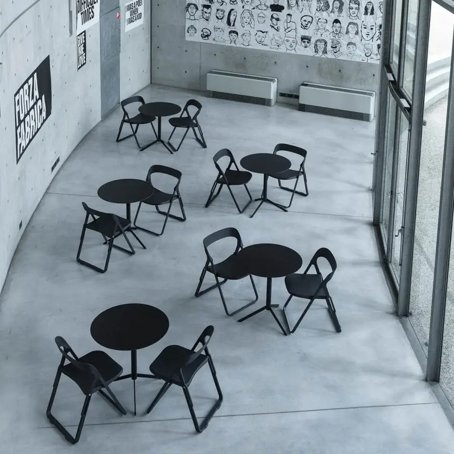 Distinctive Casamania Bek chair in matte black with fiberglass-reinforced injection molding and smooth sliding supports