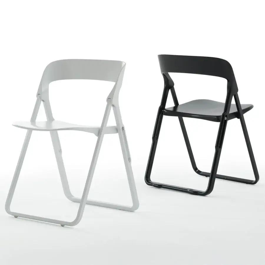 Elegant Casamania Bek chair in stark black with injection-reinforced fiberglass and smooth finish