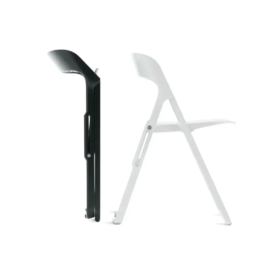 Harmonious Casamania Bek chair in smooth black plastic with a folding mechanism and angular lines