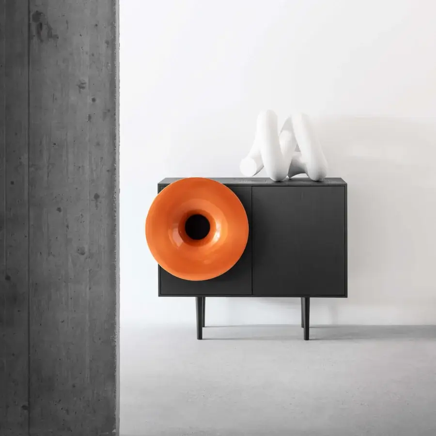 Elegant Miniforms Caruso bar cabinet crafted in dark wood with cylindrical legs and matte finish