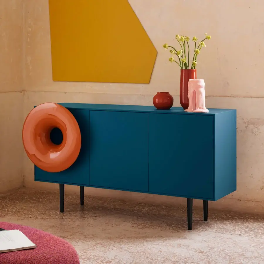 Distinguished Miniforms Caruso bar cabinet in matte teal blue with a striking orange donut-shaped speaker crafted in Italy