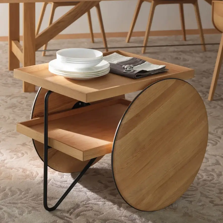Distinguished Casamania Chariot bar cart crafted in Italy with warm-toned wood and curved black metal frame