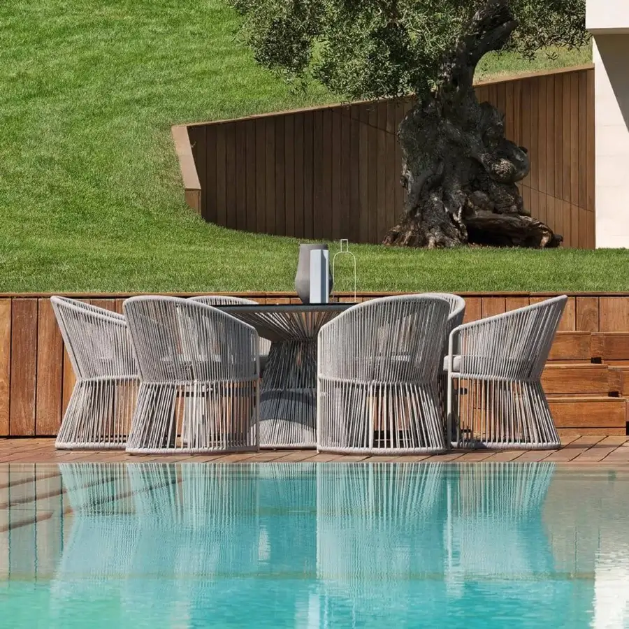 Distinguished Varaschin Tibidabo table with round lines crafted in VAR#TEX Bronzo Rope and dark gray woven base
