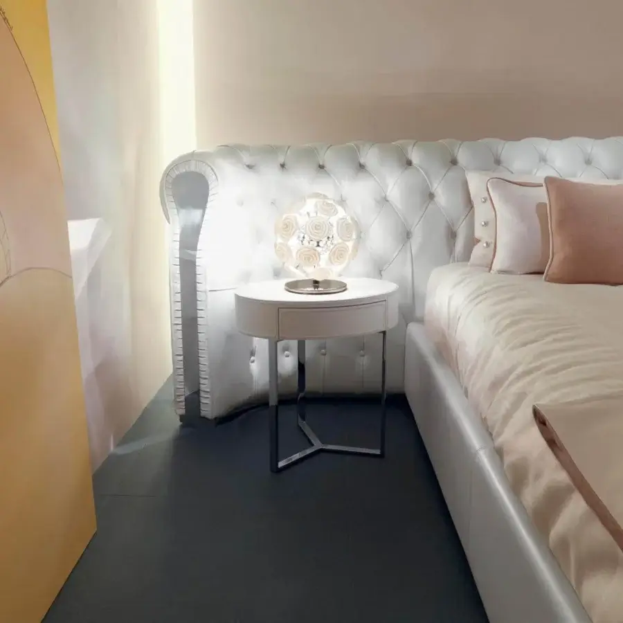 Superior Rugiano Just nightstand with oval white leather top and sleek steel metal base crafted in Italy