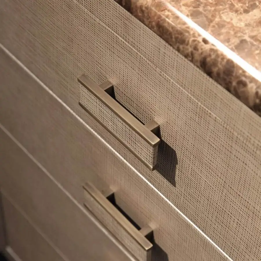 Exclusive Rugiano Bach dresser with curved structure, leather drawers and a veined brown stone top with bronze finish