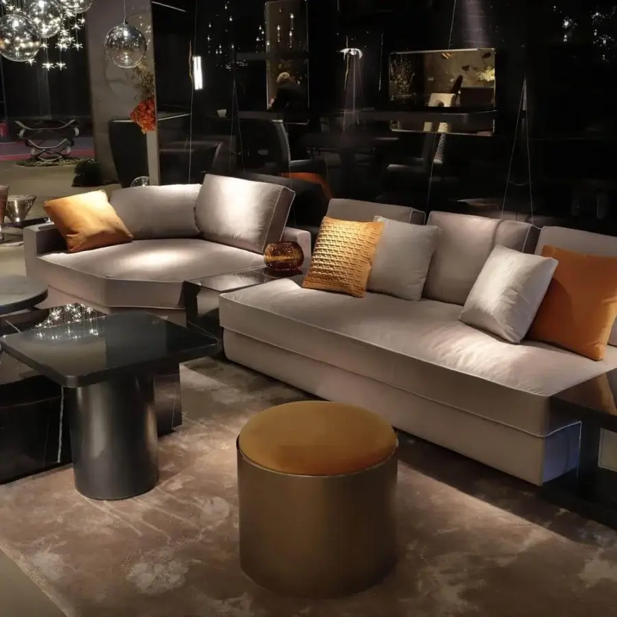 Superior Reflex Adone sectional with a contemporary modular design in light gray fabric and chromatic accent pillows