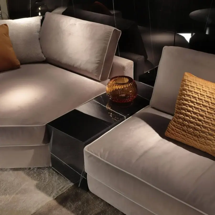 Lavish Reflex Adone sectional crafted in Italy with plush taupe textile upholstery and elegant piping detail