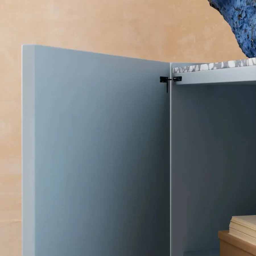 Elegant Miniforms Containerup bar cabinet in light blue lacquered wood with speckled grey and white top