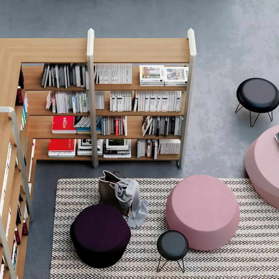 Lavish Casamania Giro ottoman upholstered in pink fabric with a matte finish embodies circular forms and movement
