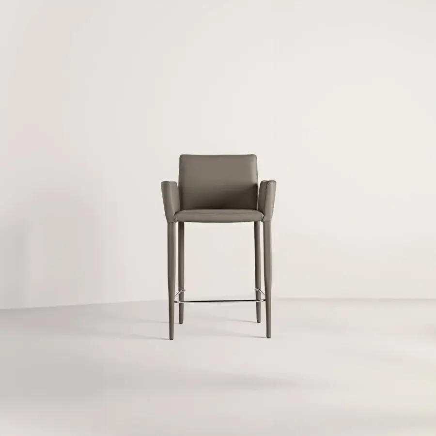 Superior Frag Bella stool upholstered in muted grey material with a slim form and horizontal metal footrest