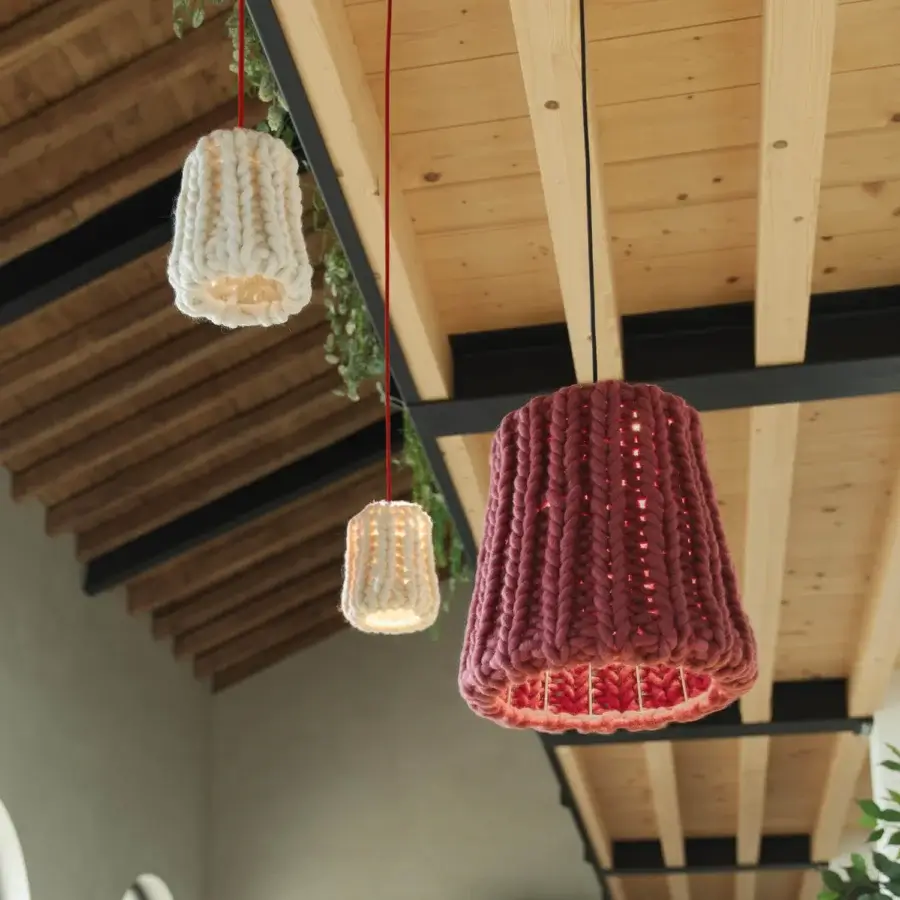 Exceptional Casamania Granny lamp, a suspension crafted in wine-red hand-woven wool sourced from Tyrolean alpine pastures with textured construction