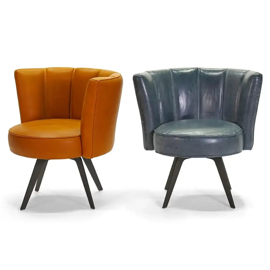 Elegant Borzalino Diva lounge chair with shell backrest upholstered in tan leather and lacquered metal legs