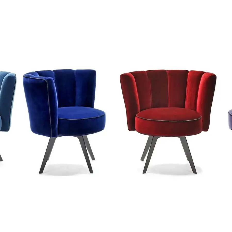 Exceptional Borzalino Diva lounge chair with dark blue velvet upholstery and channeled backrest built on a galvanized base