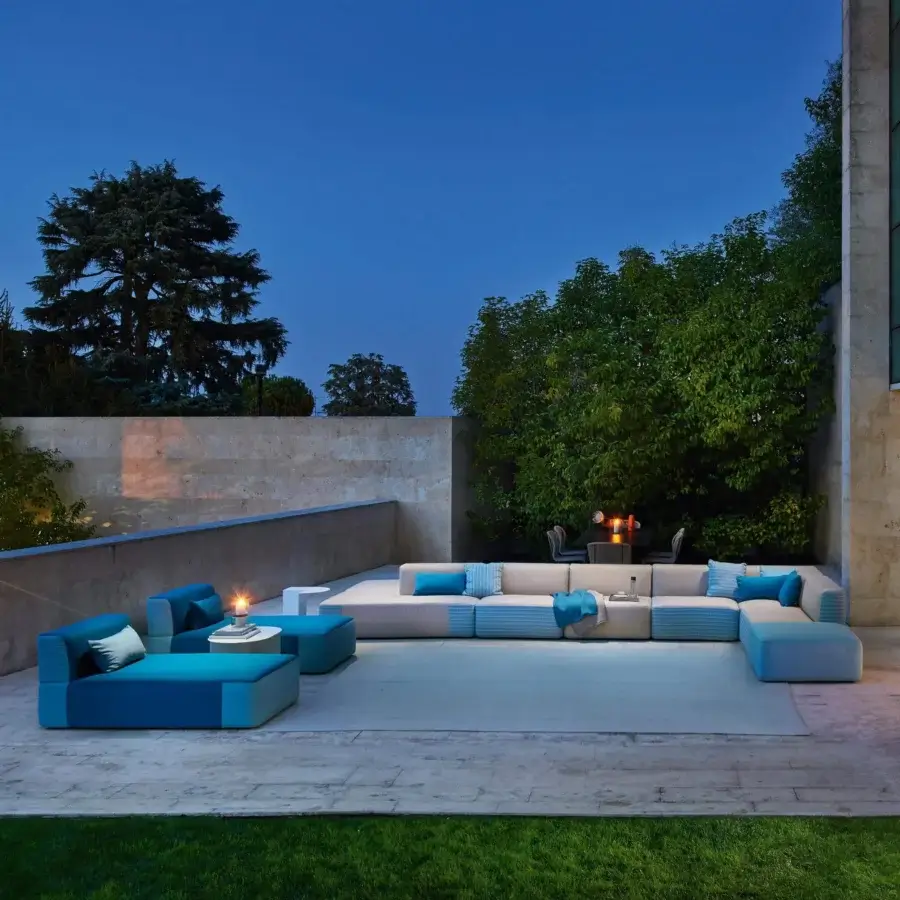 Sophisticated Varaschin Belt sectional with light beige textile and contrasting blue accents in solid okumé wood