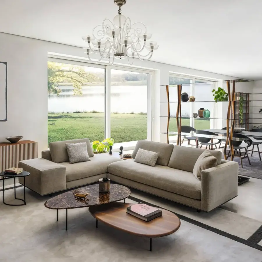 Superior Casamania Lily coffee table with an elongated oval top crafted in wood and a matte finish