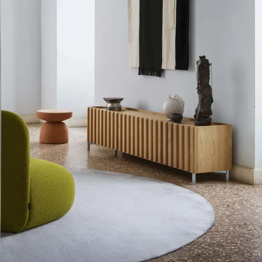 Distinguished Miniforms Container sideboard crafted in light-toned wood with grooved bi-fold doors and polished metal legs