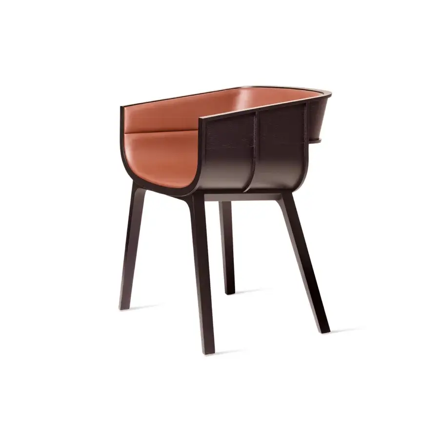 Exceptional Casamania Maritime armchair built with dark matte solid timber and brown leather-like upholstery showcasing balanced curved surfaces
