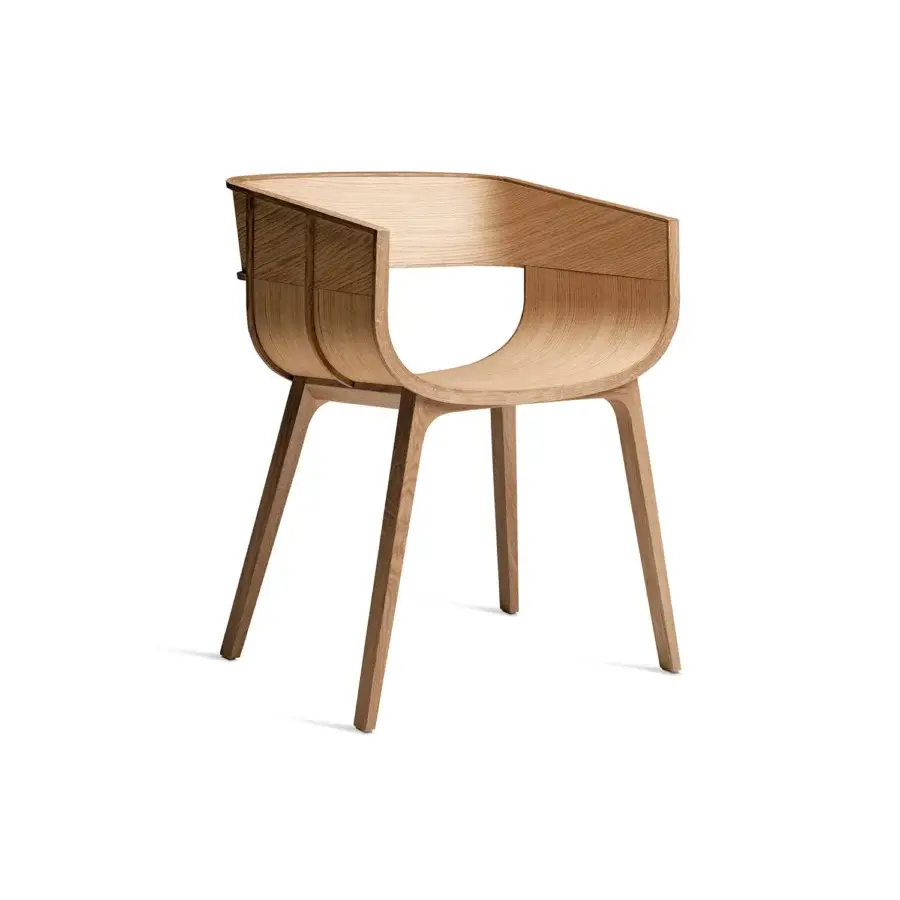Distinguished Casamania Maritime armchair crafted in light natural solid oak with curved minimalist form