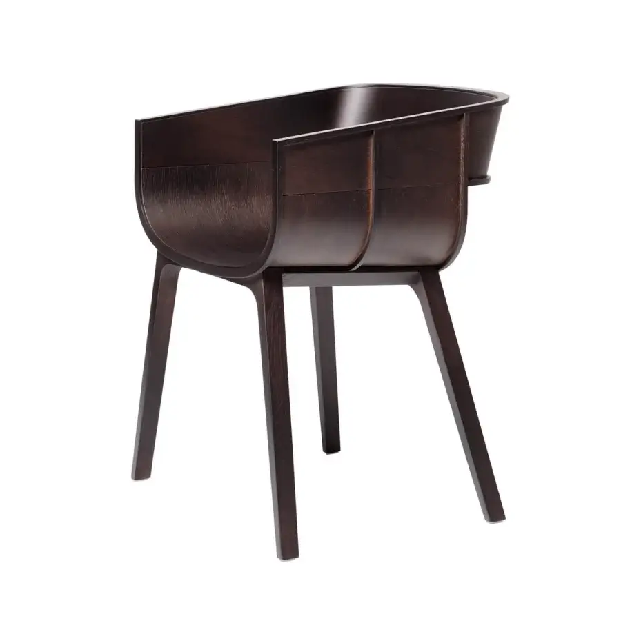 Superior Casamania Maritime armchair built in dark brown solid oak with curved surfaces and smooth grain