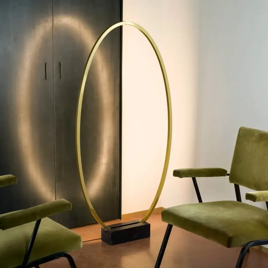Innovative Nemo Ellisse floor lamp crafted in gold and black marble with diffused LED lighting