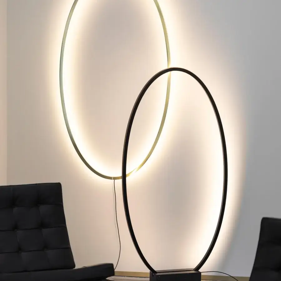 Distinguished Nemo Ellisse floor lamp in minimalist design with black frame and dark marble base offering diffused integrated LED light