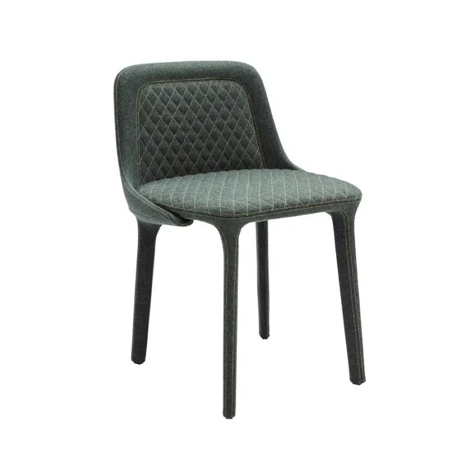Exceptional Casamania Lepel chair in muted green-gray fabric with subtle yellowish stitching and a curved backrest crafted in Italy