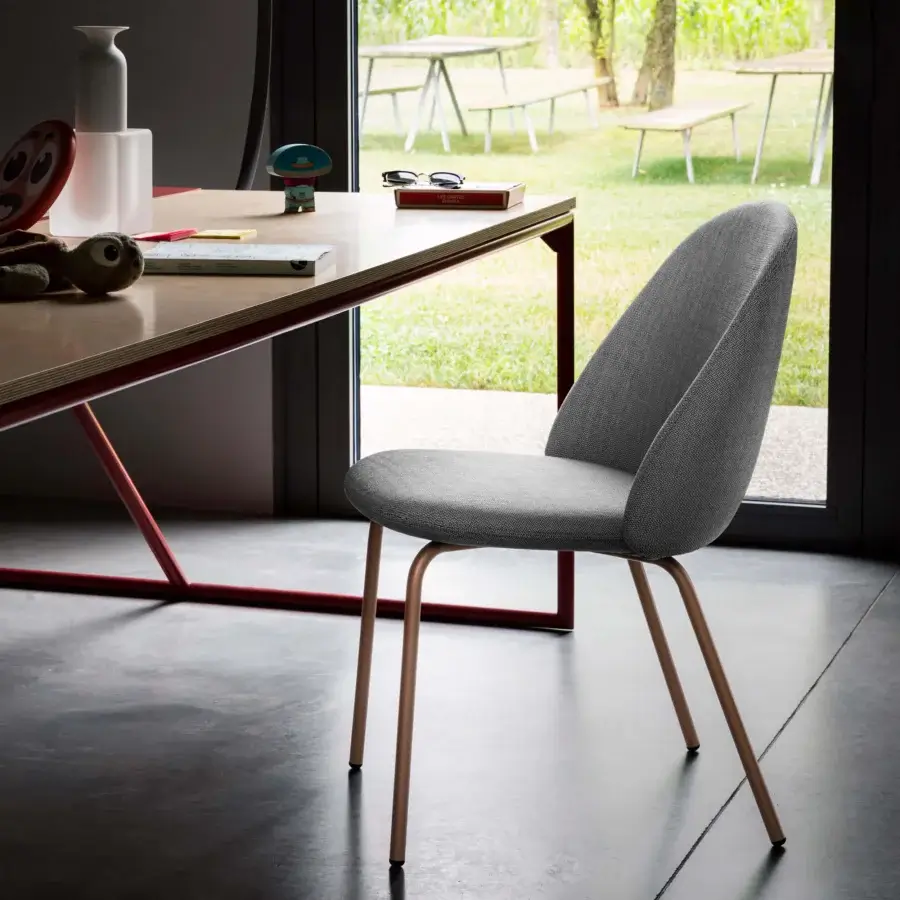 Distinguished Miniforms Iola chair with gray woven textile upholstery and satin copper toned metal legs