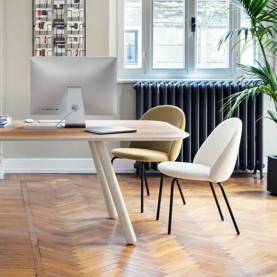 Distinguished Miniforms Iola chair with white textured textile upholstery and minimalist black metal legs