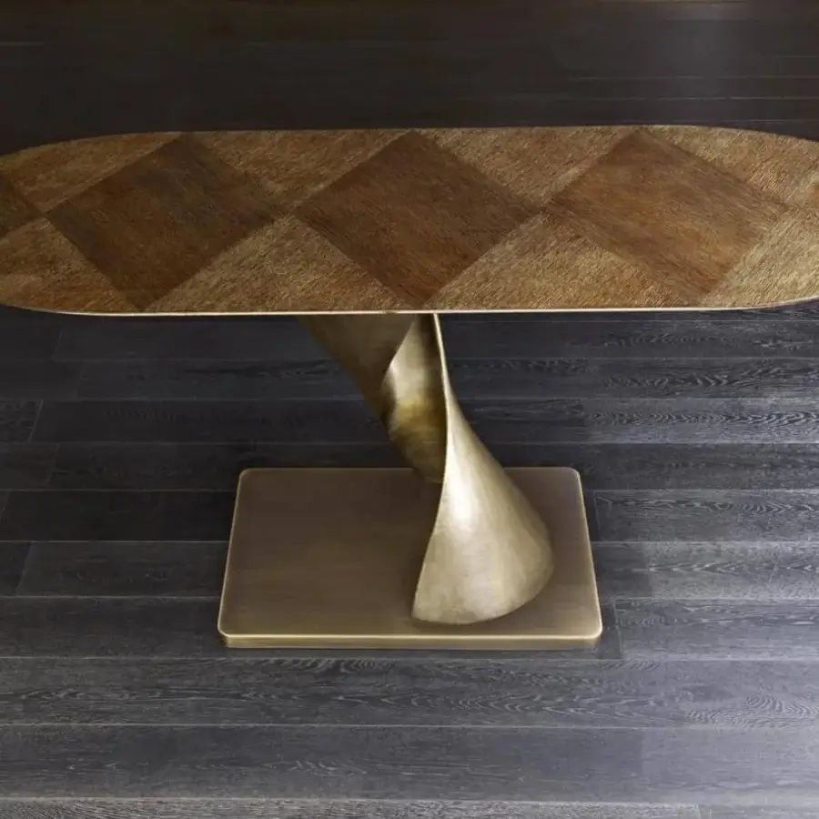 Distinctive Rugiano Zoe console with Spigato Oak tabletop exhibiting a diamond pattern and sculptural matte bronze base