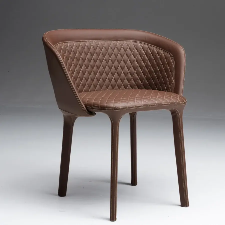 Exceptional Casamania Lepel armchair fully upholstered in premium brown leather with lighter brown diamond stitching and unified finish