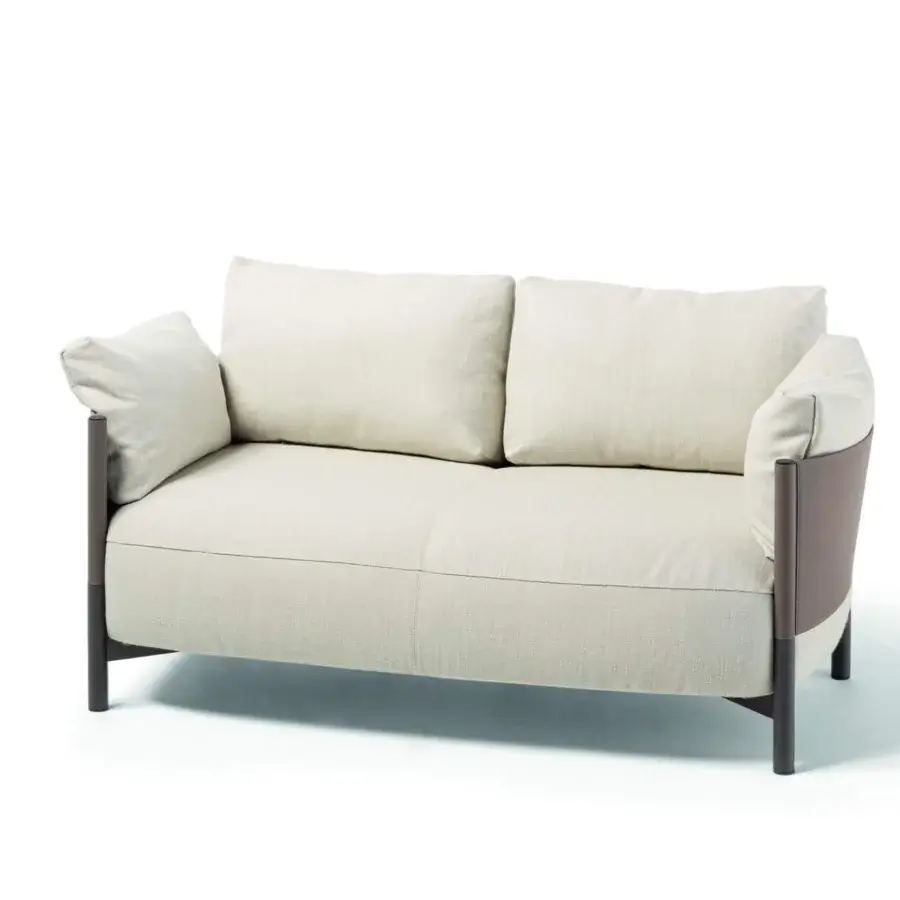 Superior Frag Syren sofa embodies comfort with light beige textile upholstery and brown leather panels built with dark metal legs