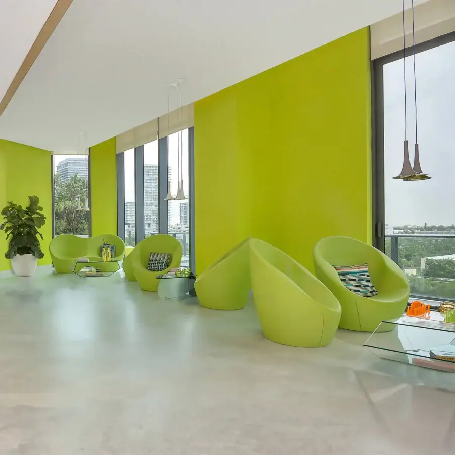 Exceptional Casamania Ouch lounge chair exhibits a voluptuous organic form upholstered in vibrant lime green fabric with a metal structure