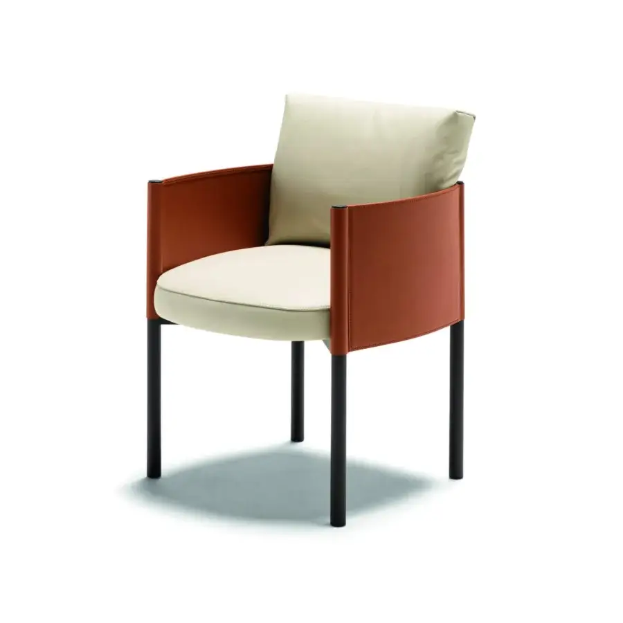 Elegant Frag Syren armchair balances softness with a reddish-brown leather shell and off-white upholstered seat built with a tubular metal frame