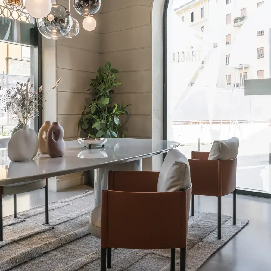 Distinguished Frag Syren armchair balances tan leather with a tubular metal frame and movable backrest for inviting comfort