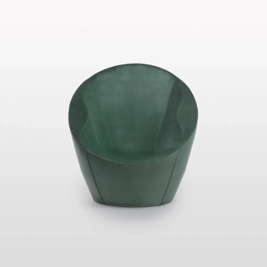 Exceptional Casamania Ouch lounge chair boasts a voluptuous organic form upholstered in smooth deep green textile with internal metal structure
